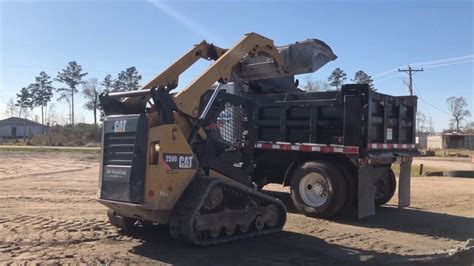 loading a skid steer onto a flat bed|youtube skid steer loader.